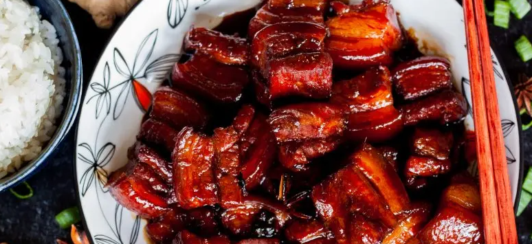 Red Braised Pork Belly (Hong Shao Rou) is a popular Chinese dish often cooked at gatherings and celebrations.