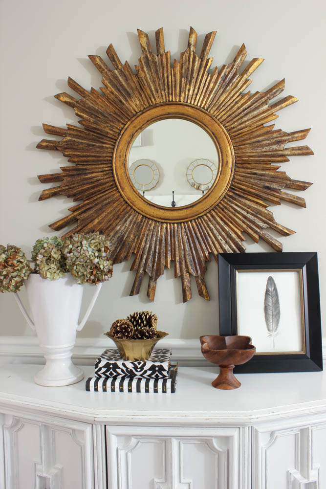 Black white and gold vignette entryway