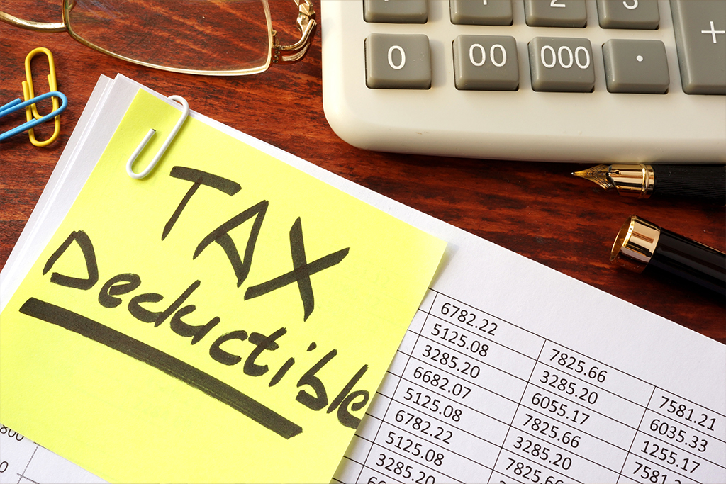 Image of Tax Deductible post it