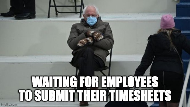 Bernie Sanders in mittens meme patiently waiting in the cold for employees to submit timesheets on time. Funny timesheet reminder meme for persistent managers.
