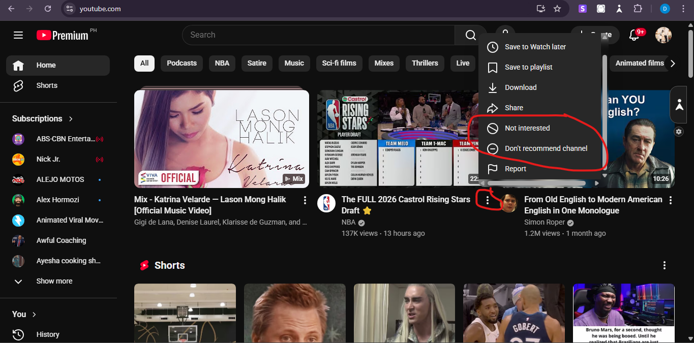 YouTube homepage video menu (three dots) showing ‘Not interested’ and ‘Don’t recommend channel’ options.