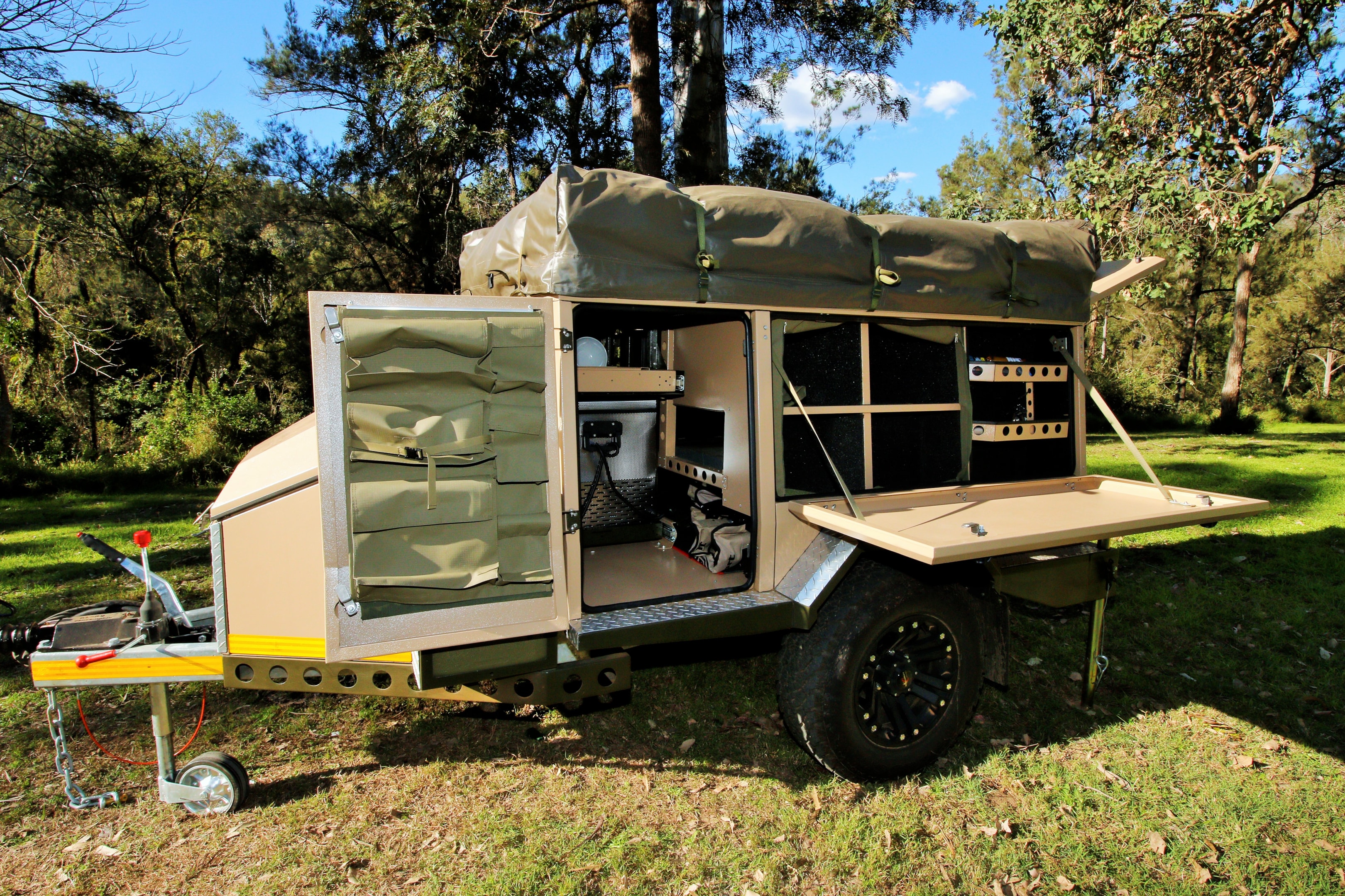 There are drop down PVC liners to help keep the dust and mud out of all the cargo bays.