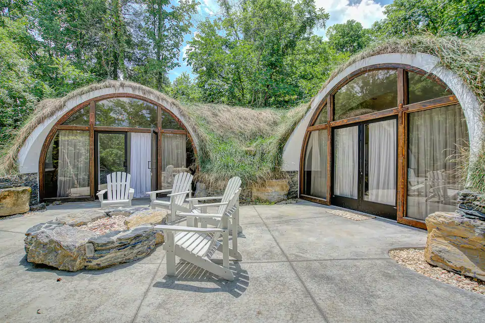 One queen bed in an earth dome.