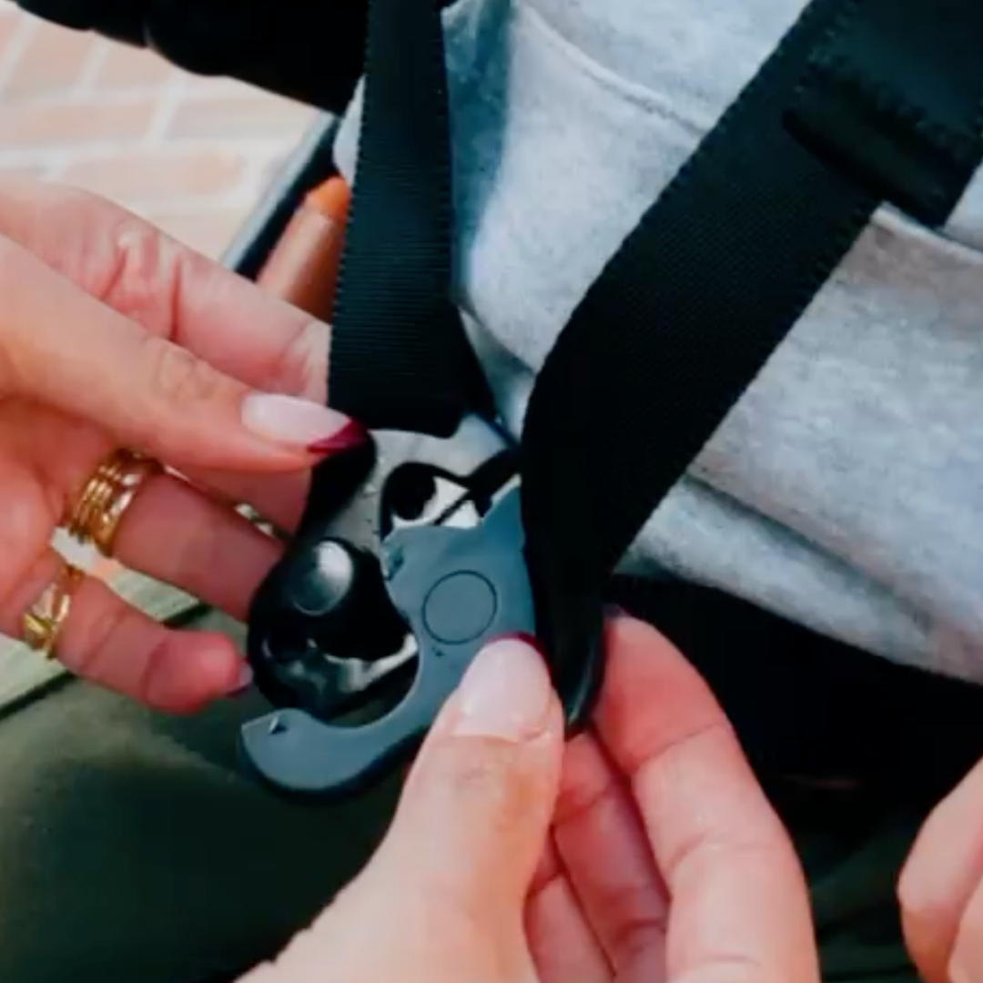 Close-up of the stroller's magnetic safety harness