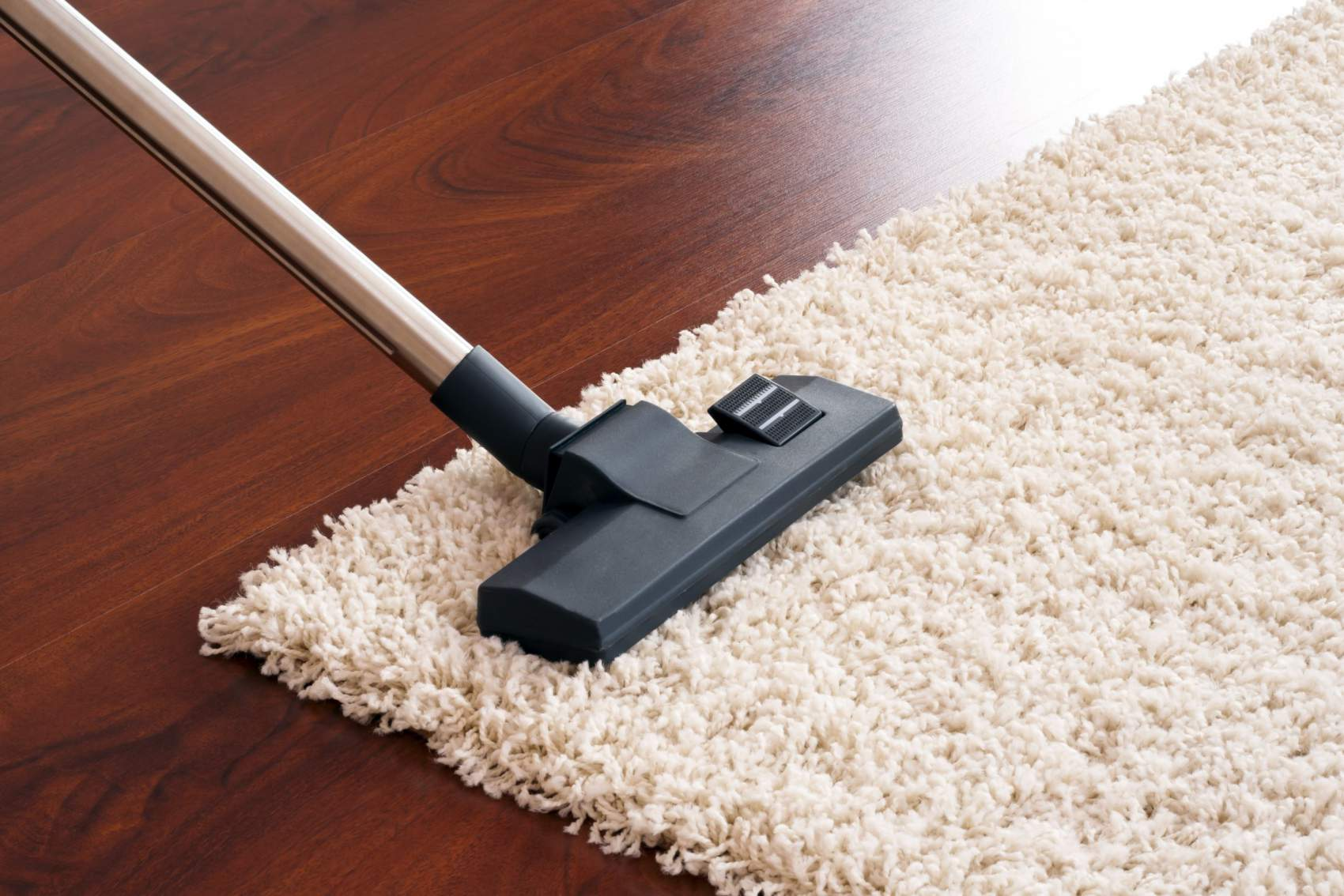 When deep cleaning natural fiber rugs, you should vacuum all sides of the carpet fibers