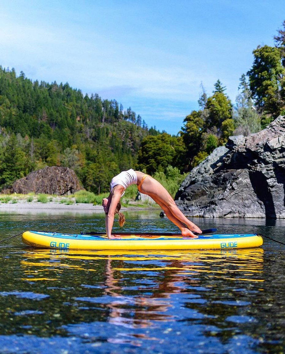 sup yoga on a paddle board