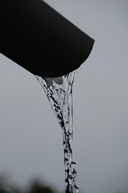how to clean a gutter downspout