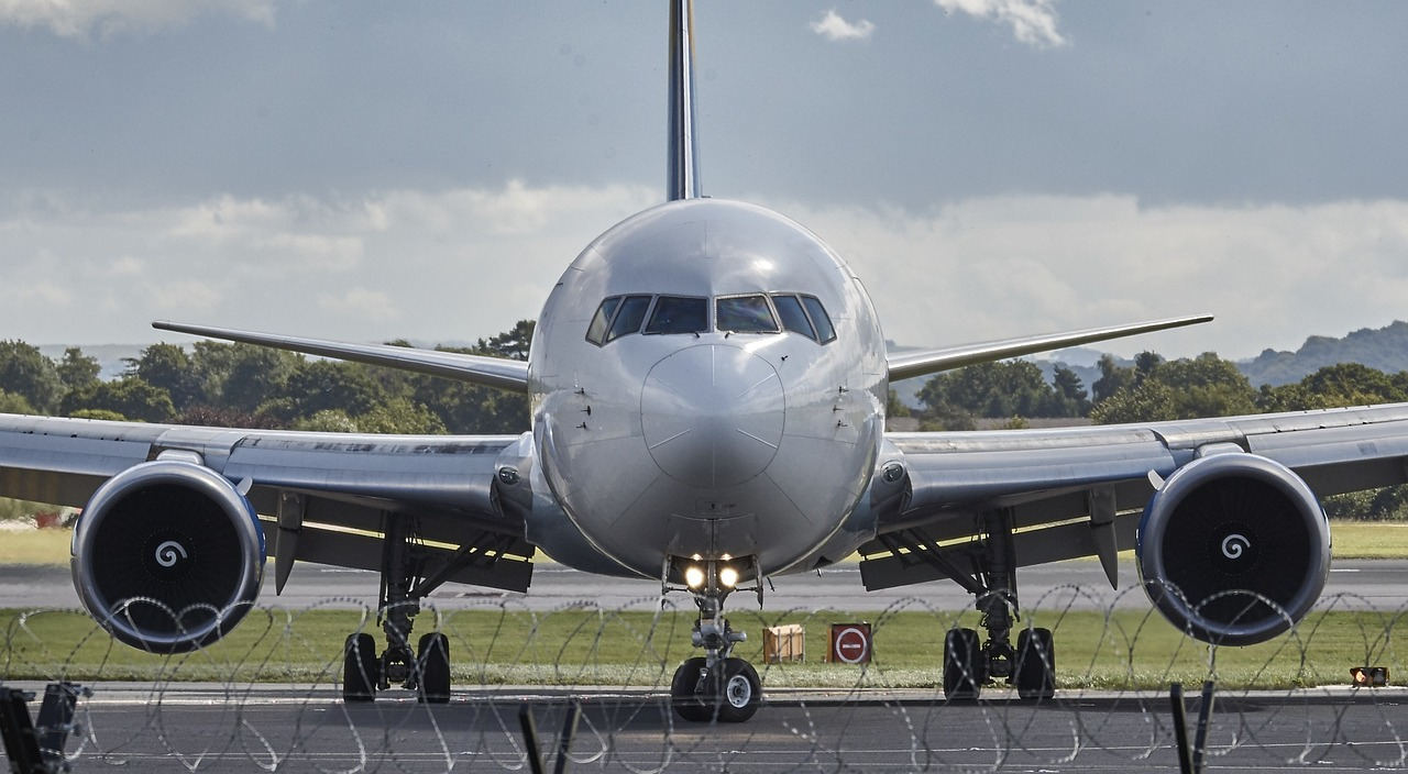 Advantages of air transport: An aircraft taxiing to the runway at an airport.