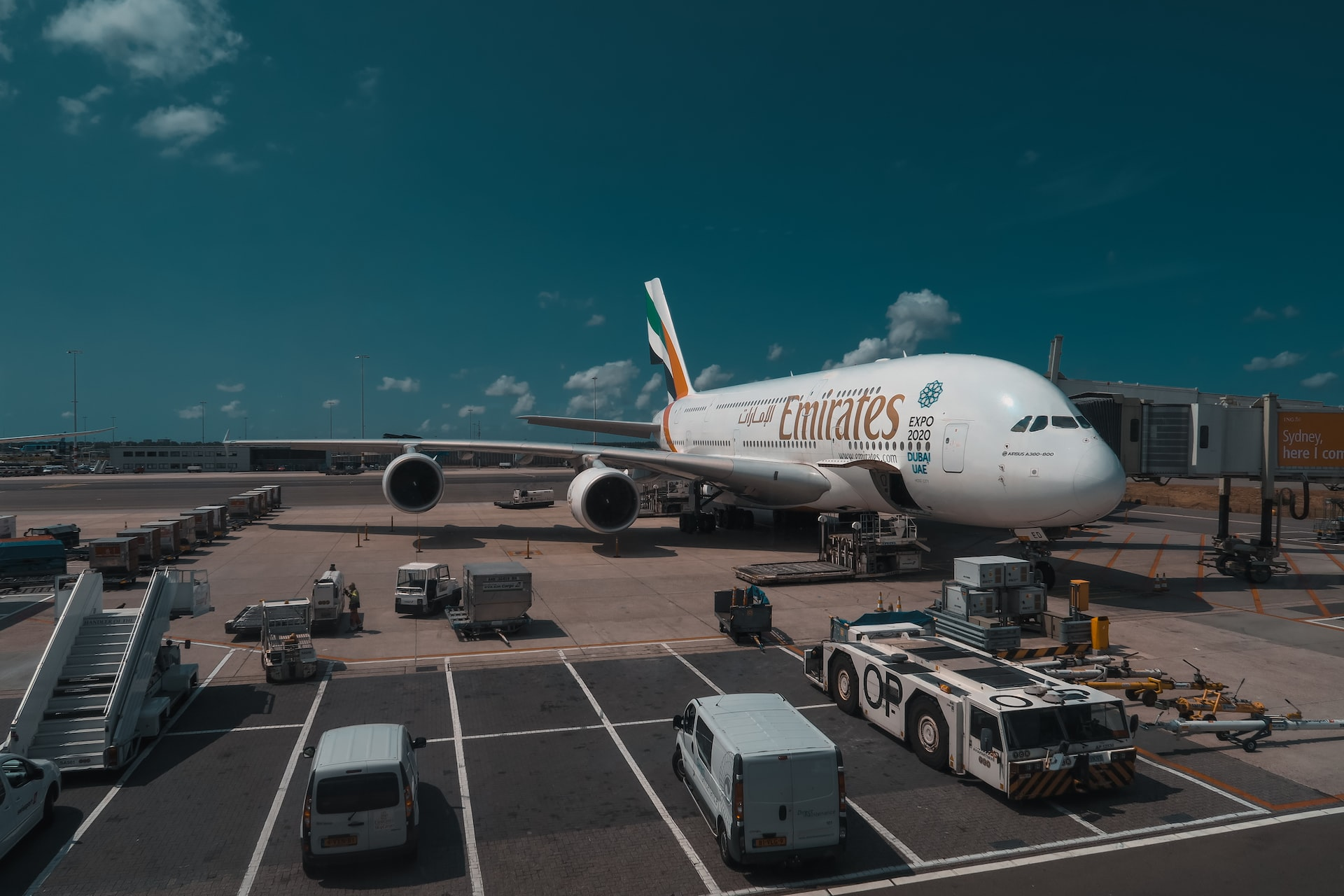 Flight phases: an Emirates aircraft preparing for flight in a pre-flight planning phase.