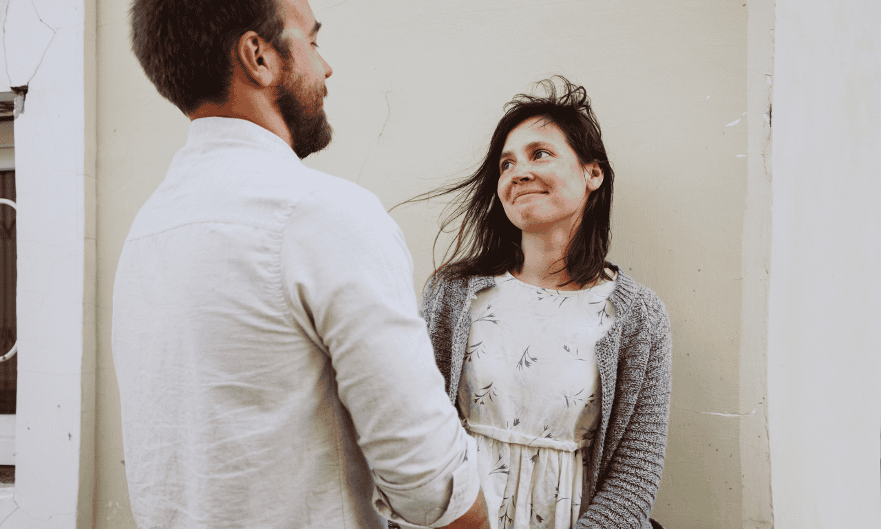 A couple looking at each other after having a good kiss!