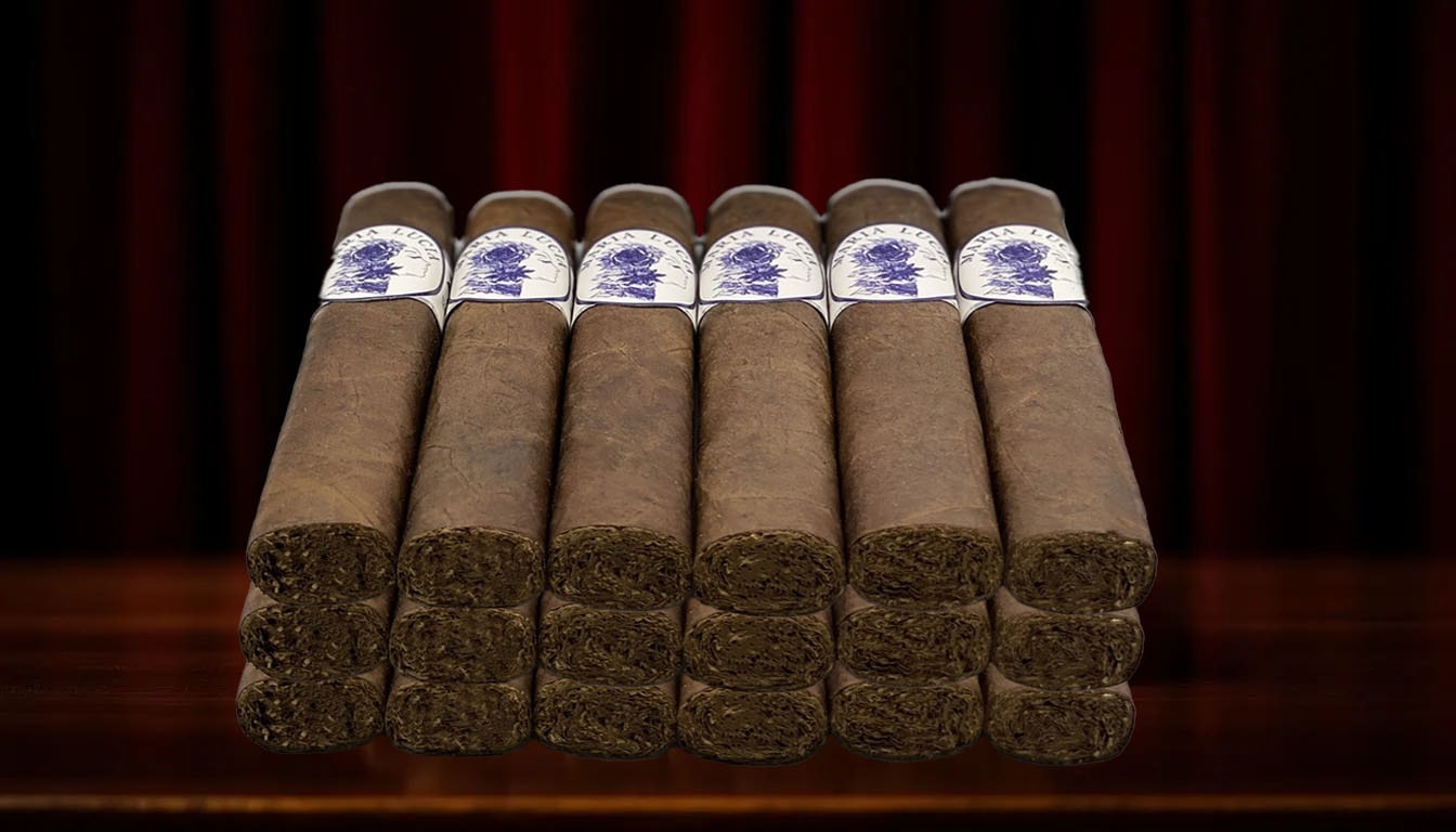 A close-up of various premium cigars including box pressed cigars.