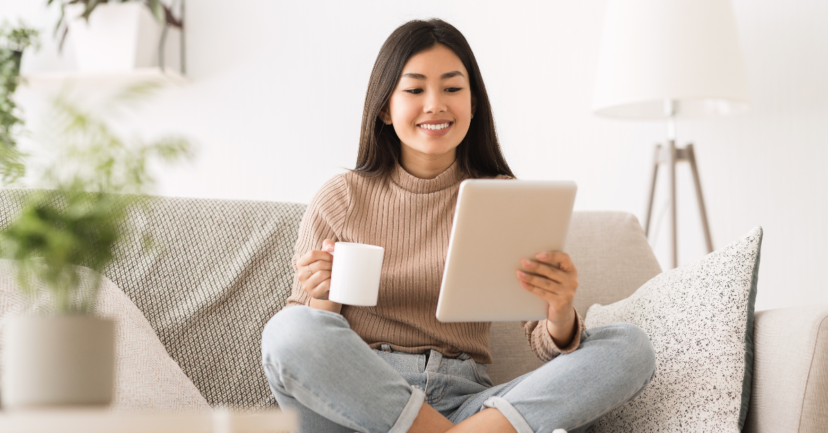 A woman reviewing PayPal taxable payments before filing taxes