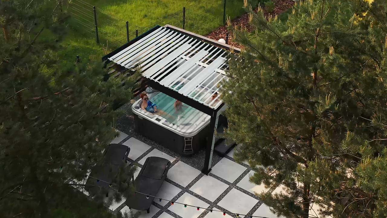 The Luxury pergola over a backyard hot tub