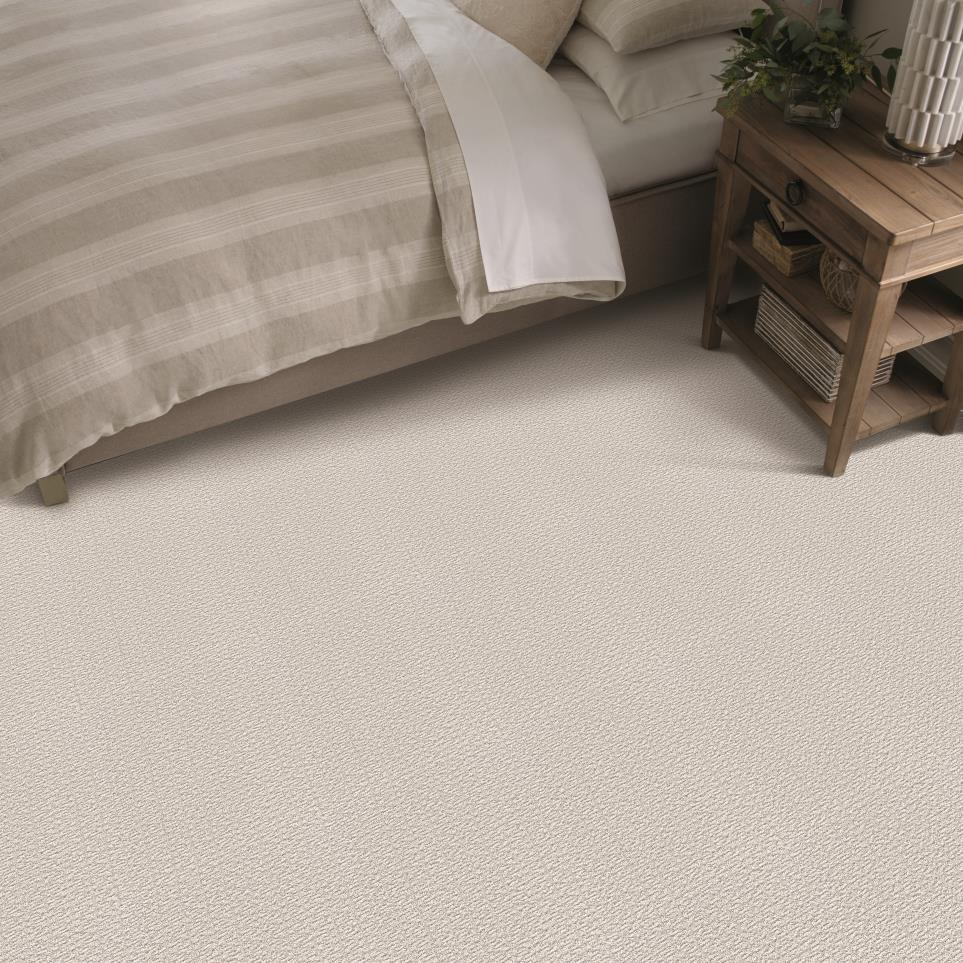 Oath by Resista carpet in a monochromatic beigh bedroom adds softness and texture