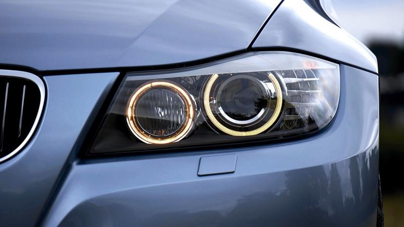 Front LED headlights in car.