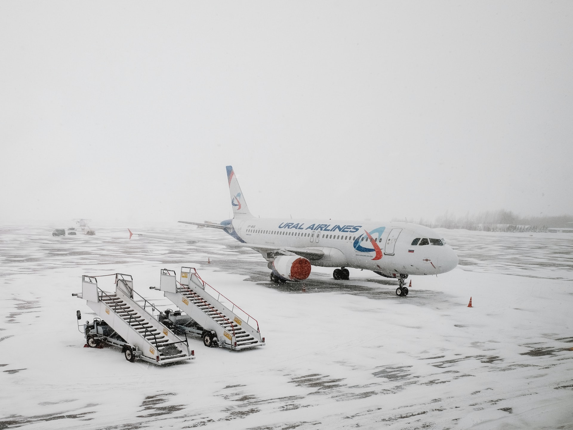 Types of fog: An aircraft stationed on tarmac in freezing fog.