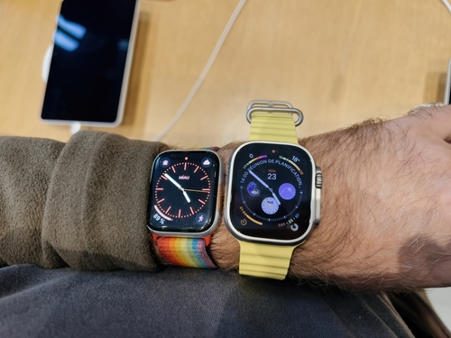 An image of a person wearing an Apple Watch with a band of different sizes