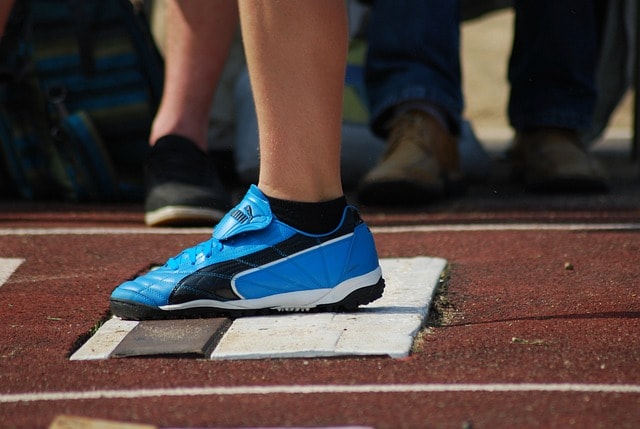 A person doing athletics showcasing the importance of varying forms of exercise.
