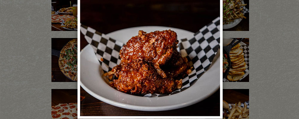 A plate of Mad Pecker Brewing Co.'s craft beer and wings combo.