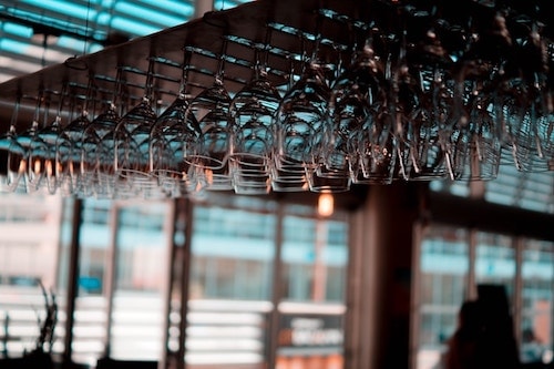 Wine glasses ready to pair with dishes at a local restaurant