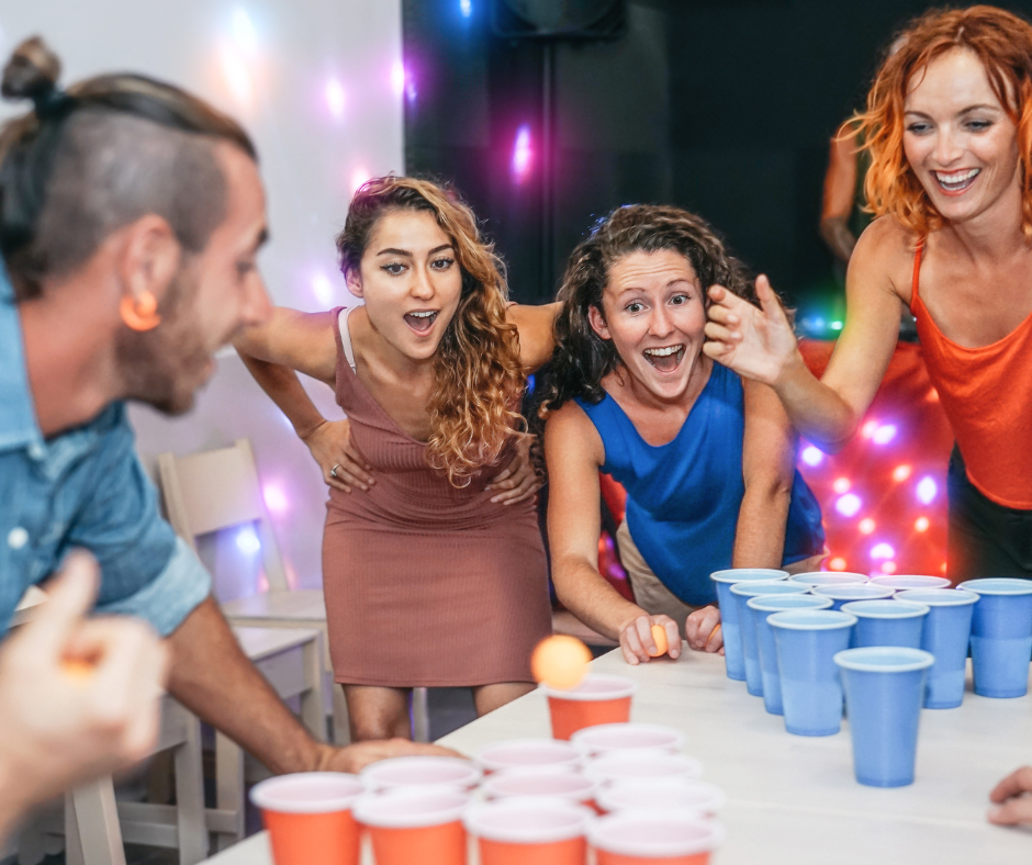 People playing a game of beer pong at a sober party