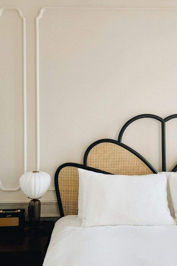 a custom made bed frame with gorgeous high quality materials in a scallop or floral shape; we love the finished product