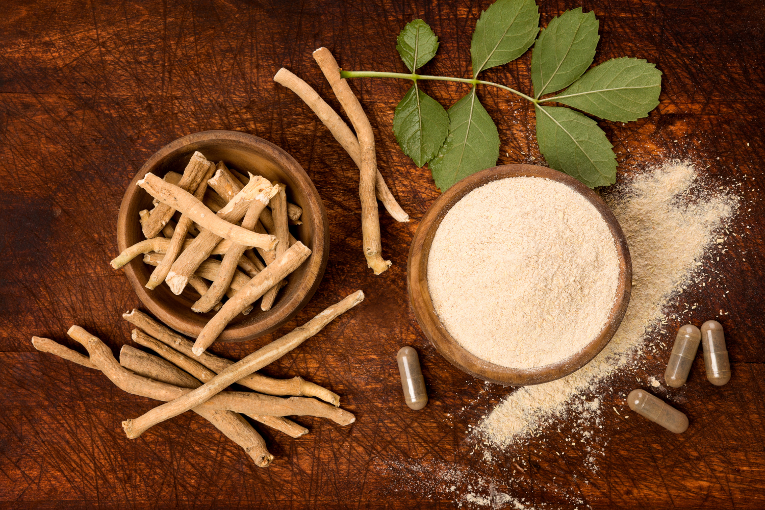 A display of ashwagandha roots and powder.