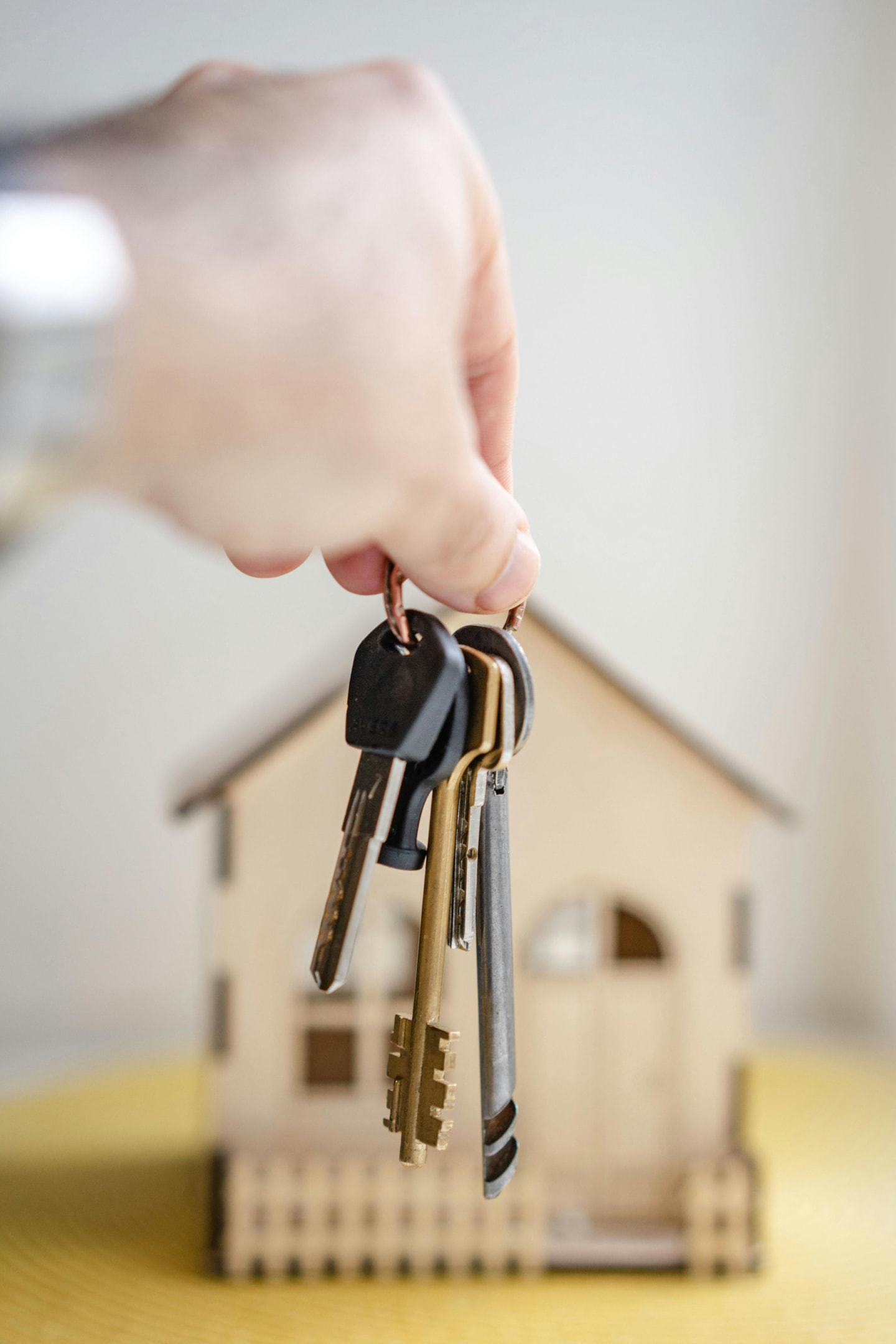 Investor holding keys to new property.