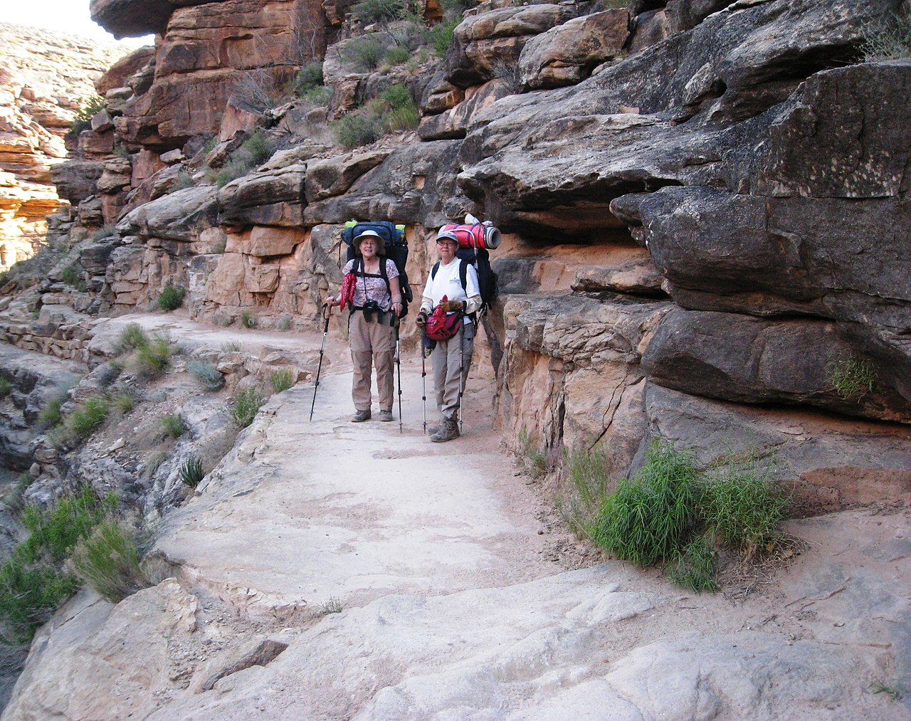 2 hikers, trail