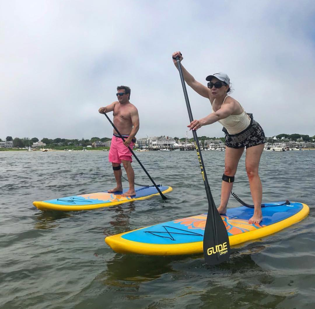 paddling two paddle boards