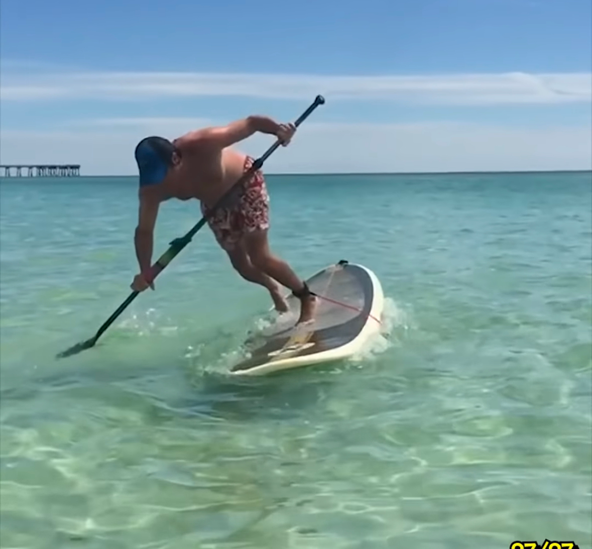 falling off a paddle board