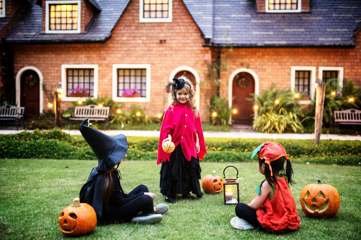 Adorable babies and toddlers in cute Halloween costumes, including a little pumpkin and a fairy.