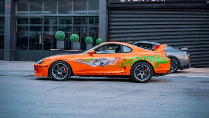 A soprst car with vinyl wrap OEM bumper