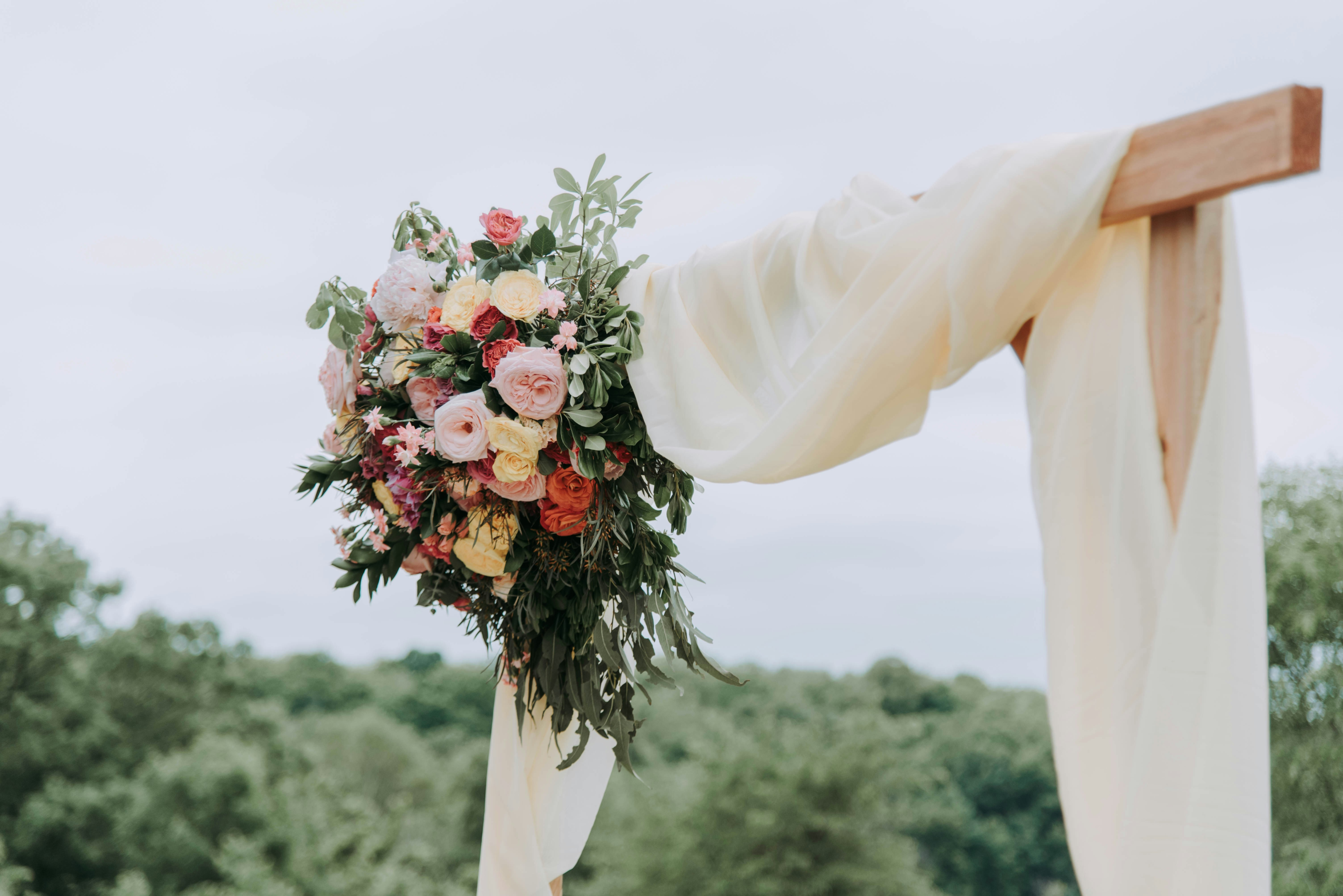 https://unsplash.com/photos/bouquet-of-assorted-color-flowers-hanged-on-brown-plank-with-white-textile-x40Q9jrEVT0
