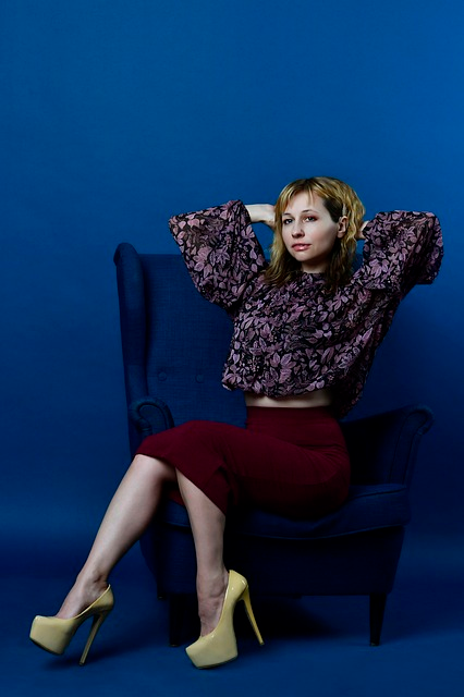 woman, pencil skirt, chair