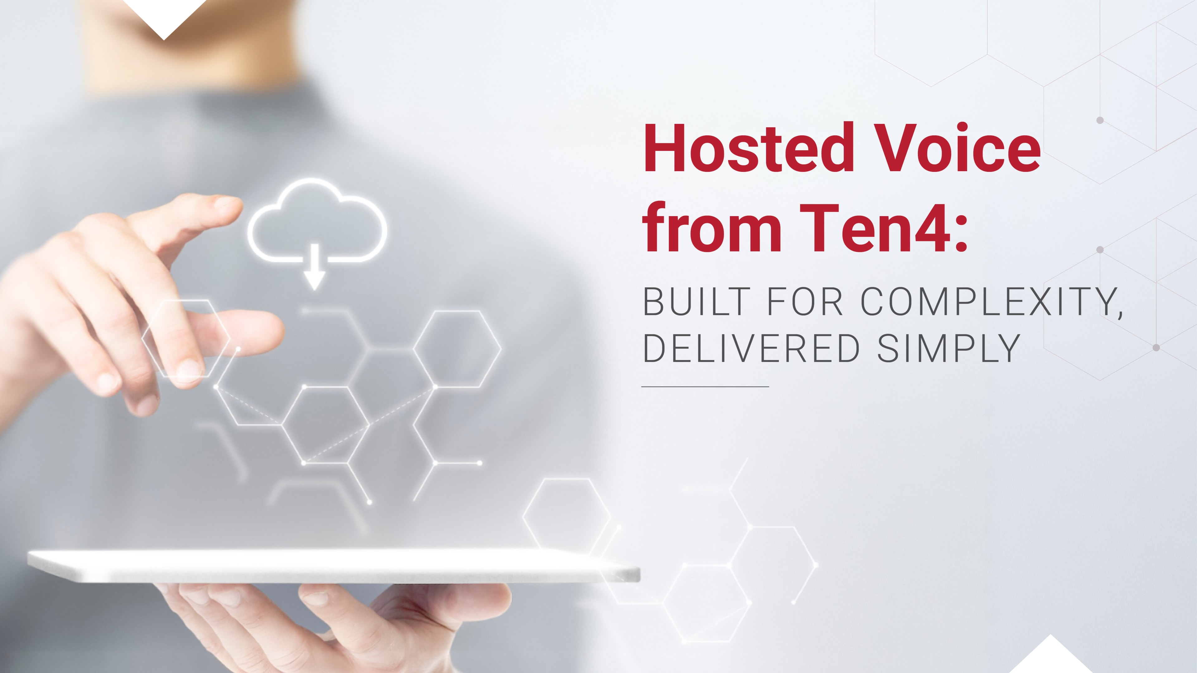 Hand holding a tablet with a glowing cloud download icon and hexagonal tech graphics.