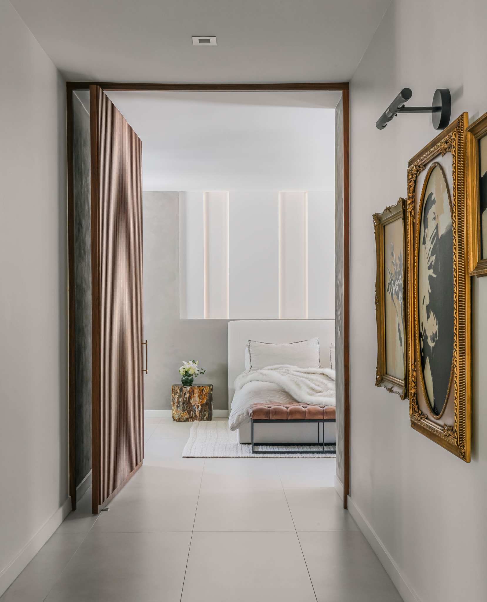 A view from the hall into Coconut Grove's primary suite, by House of One.