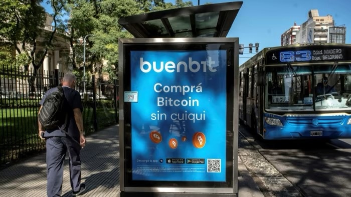 Bitcoin advert on side of bus stop in Argentina.