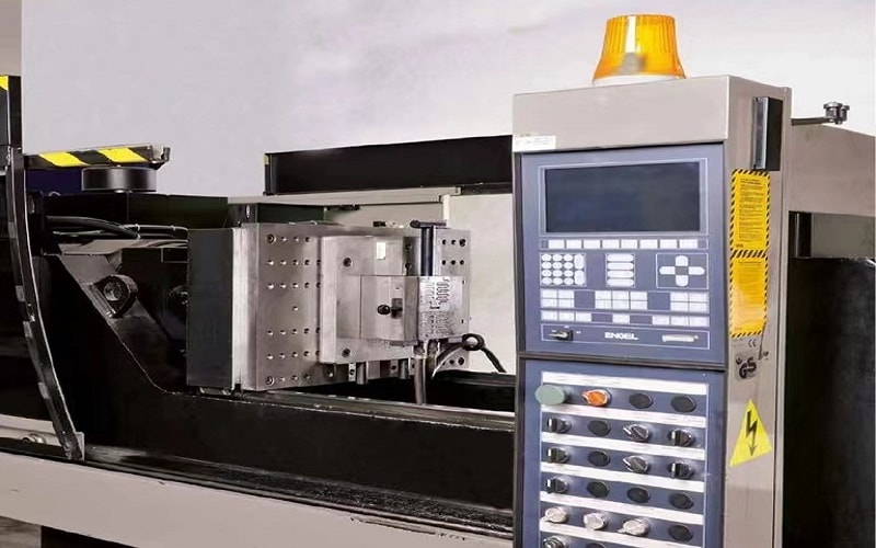 TPV in injection molding, depicted through a machine in action.