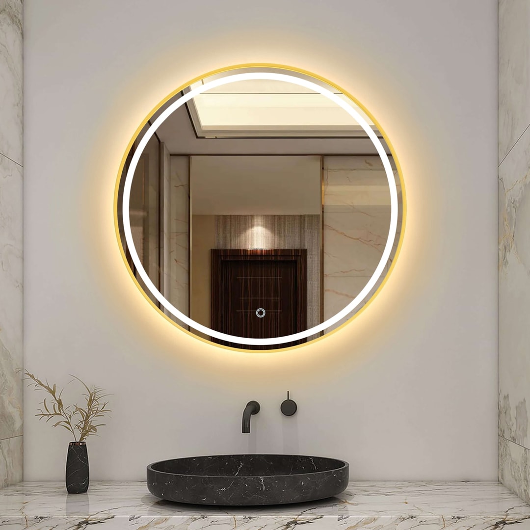 Modern bathroom with a round backlit mirror and black vessel sink, featuring sleek bathroom light fixtures and minimalist bathroom lighting ideas.