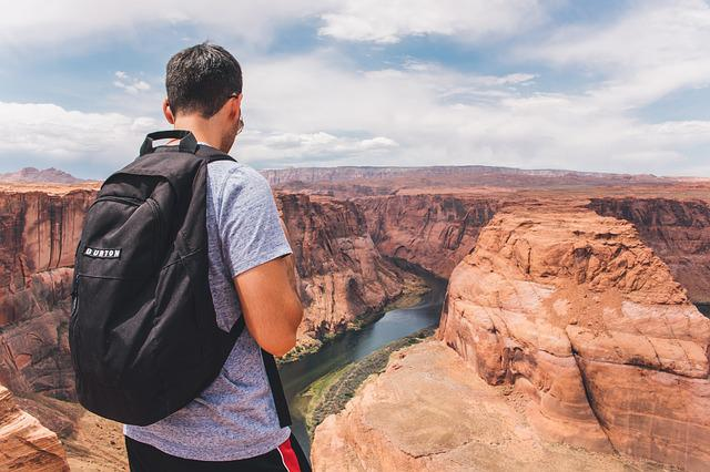 backpacker hiking in hot weather