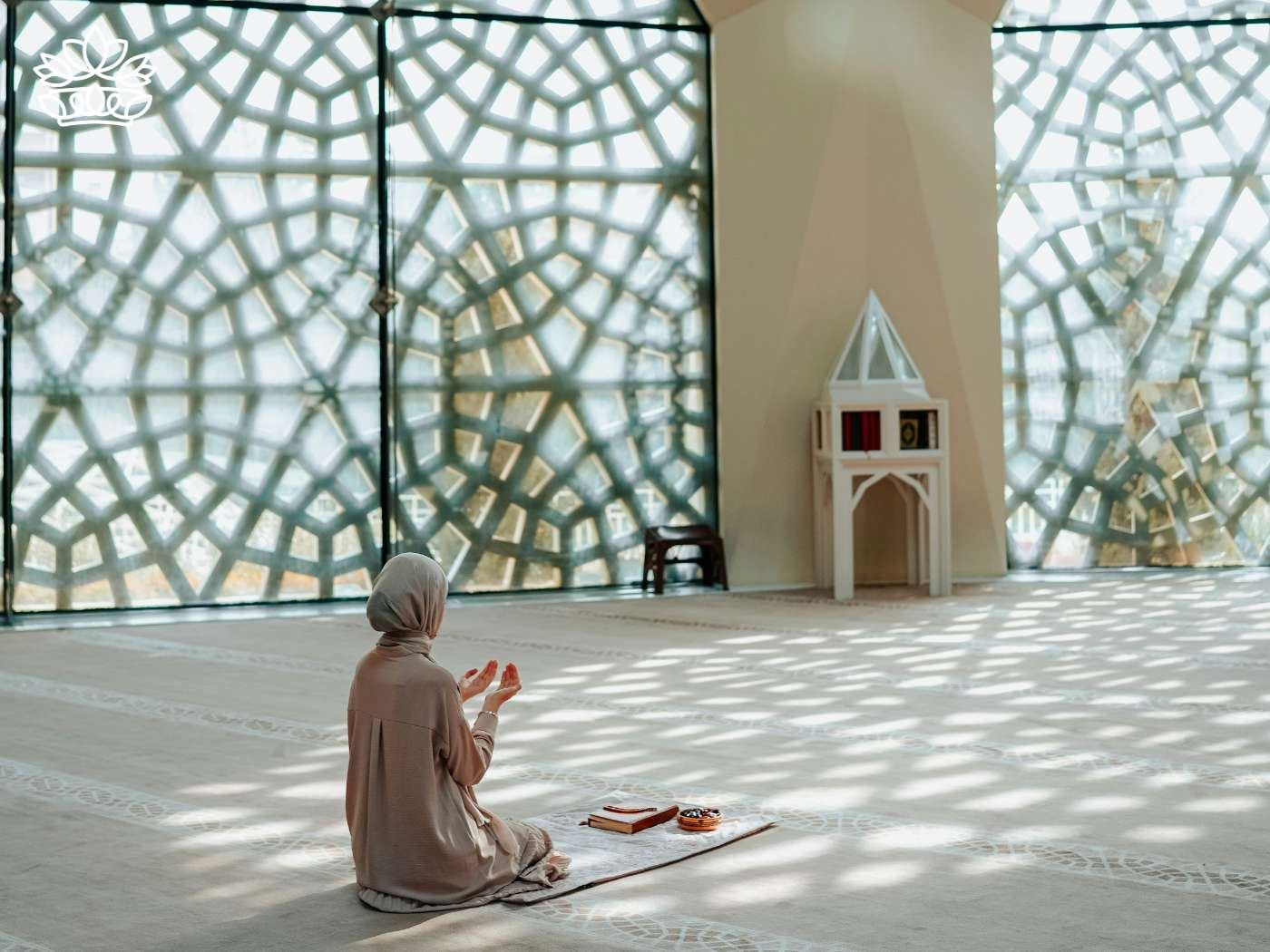 Muslim woman in a moment of devotion during morning prayer, practicing her faith in Islam and reflection with God, in a serene mosque environment, from the Eid Collection by Fabulous Flowers and Gifts.