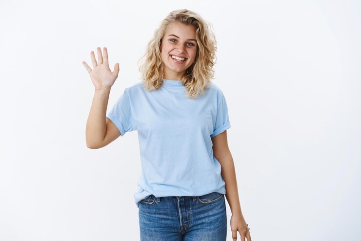 Woman waving goodbye