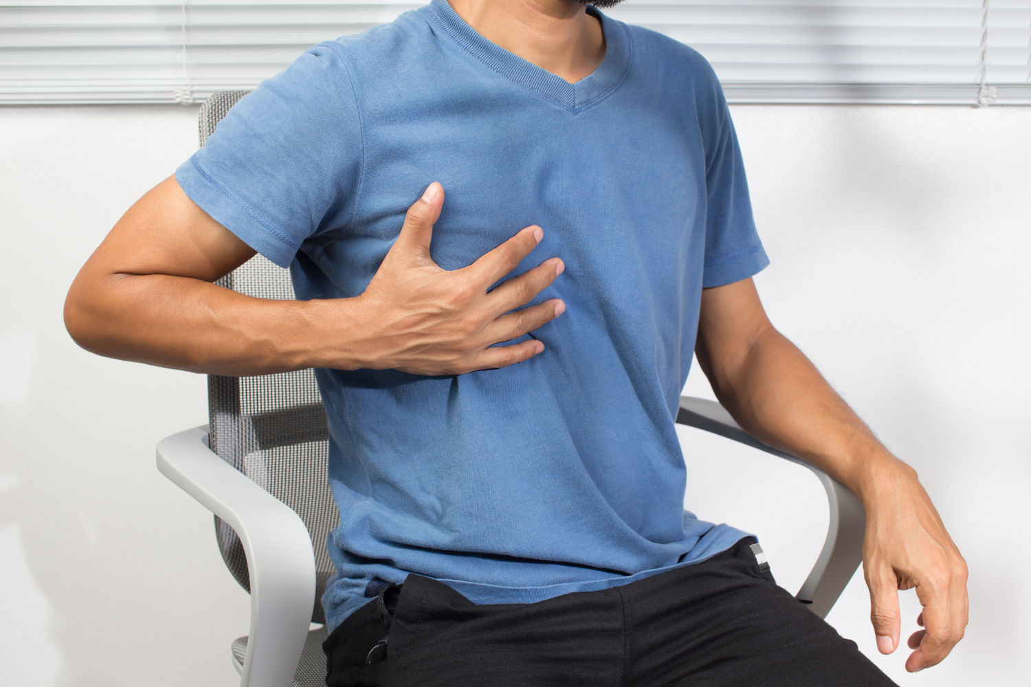Man experiencing irregular heartbeat.
