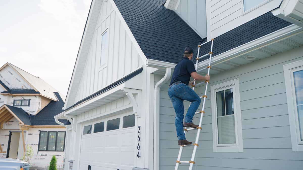 A roof inspector conducting a thorough inspection of a roof