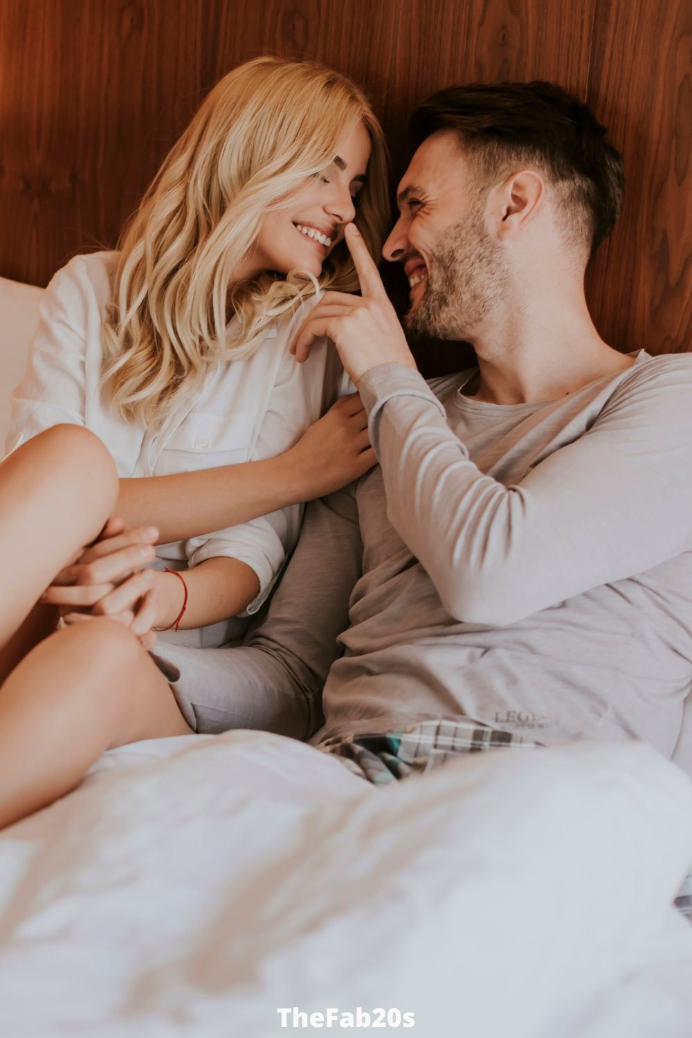 Man and woman flirty in bed - Featured in Signs He Only Wants You For Your Body
