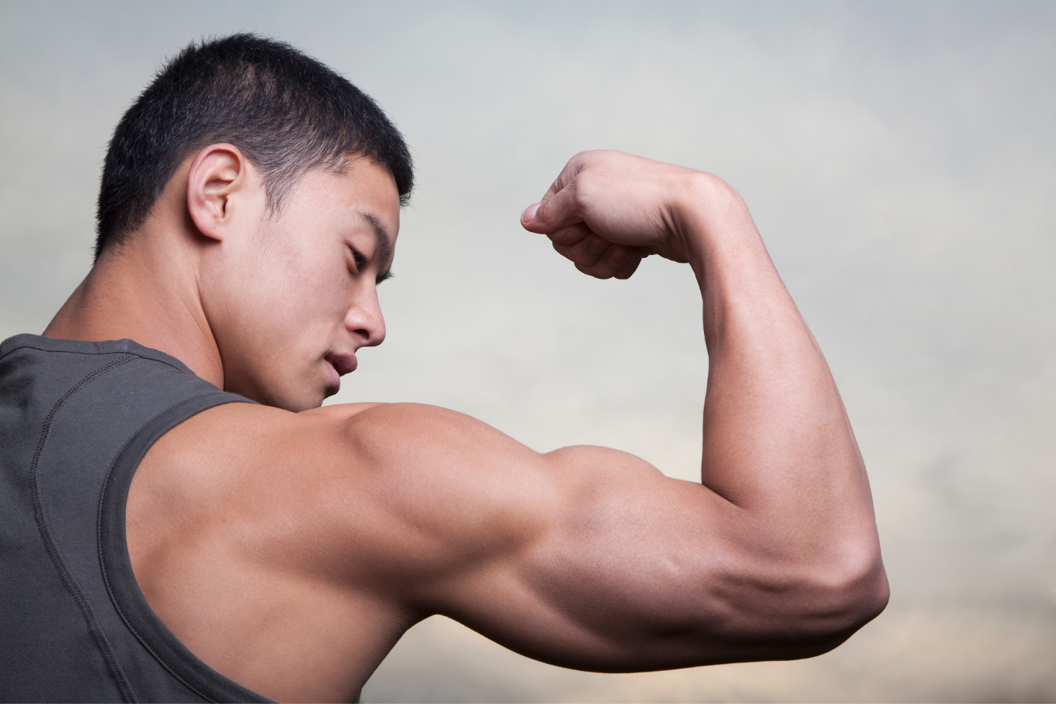 Man flexing his muscles.