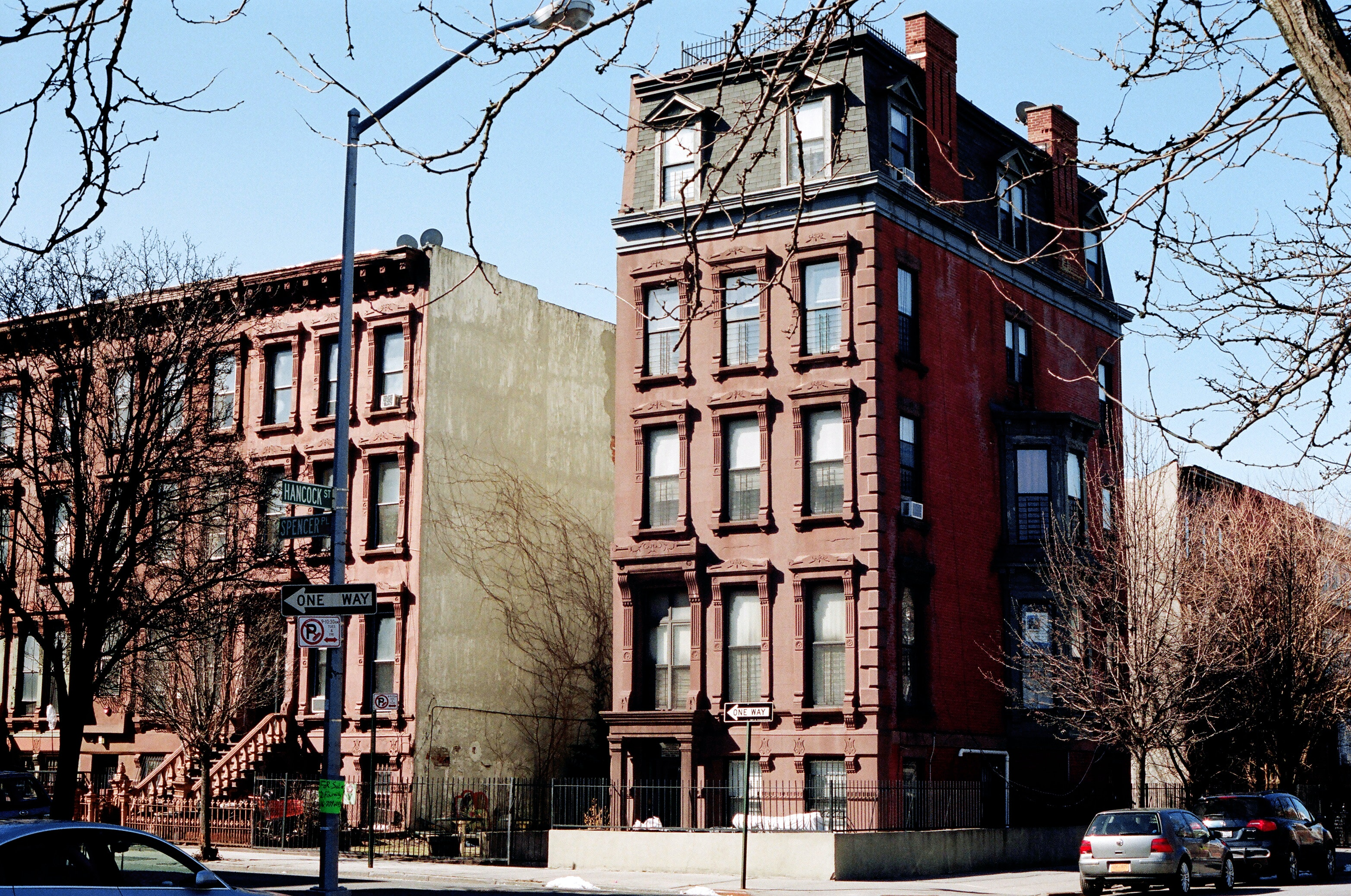 Brown concrete building providing affordable housing for tenants