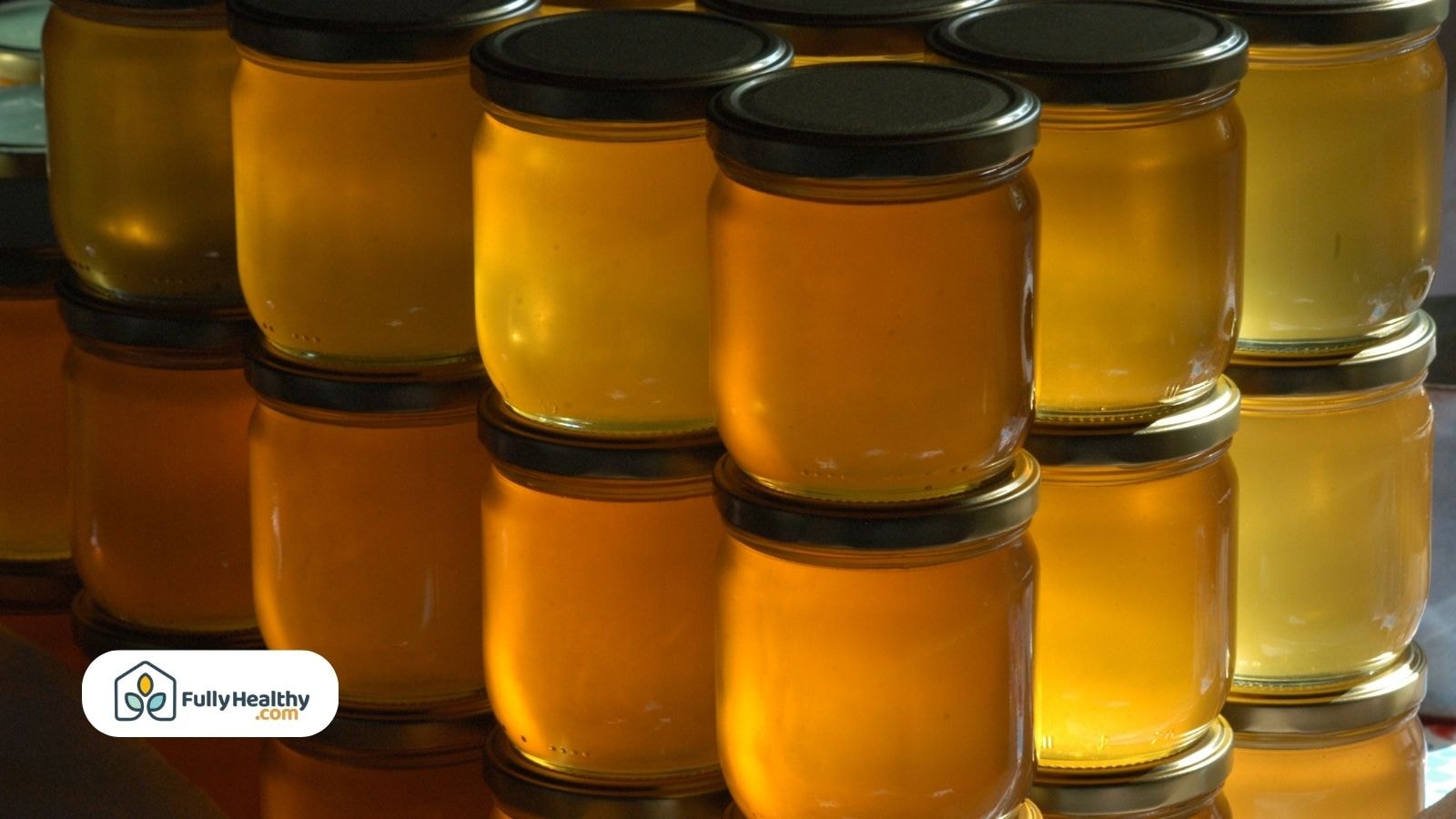 Stacked jars filled with golden honey