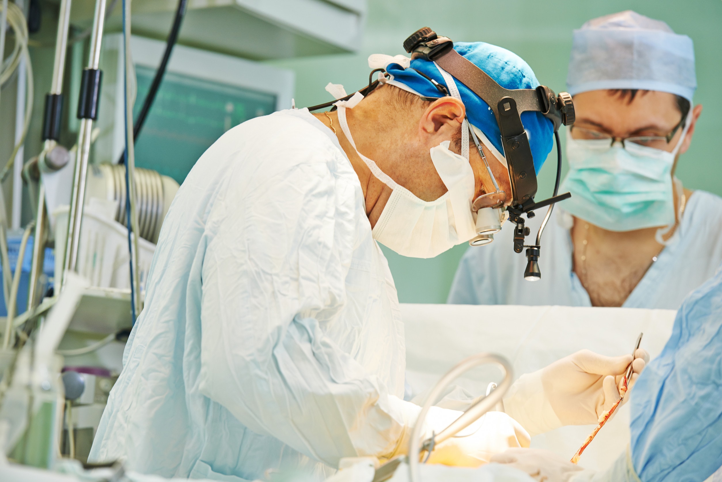 A surgeon removing a limb after a serious accident